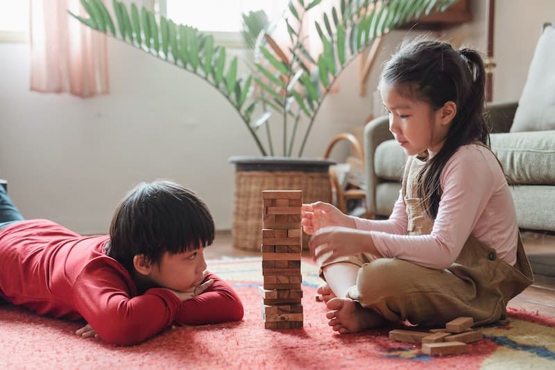 Work can be fun. Kids playing with blocks