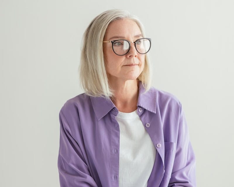 mature business woman wondering about the future