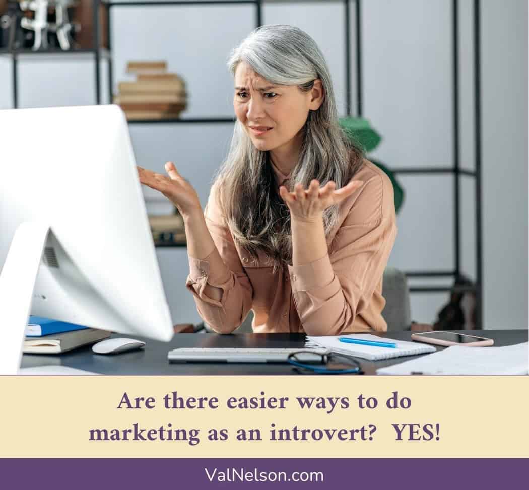 Woman frustrated looking at computer screen. Text overlay: Are there easier ways to do marketing as an introvert? YES! ValNelson.com